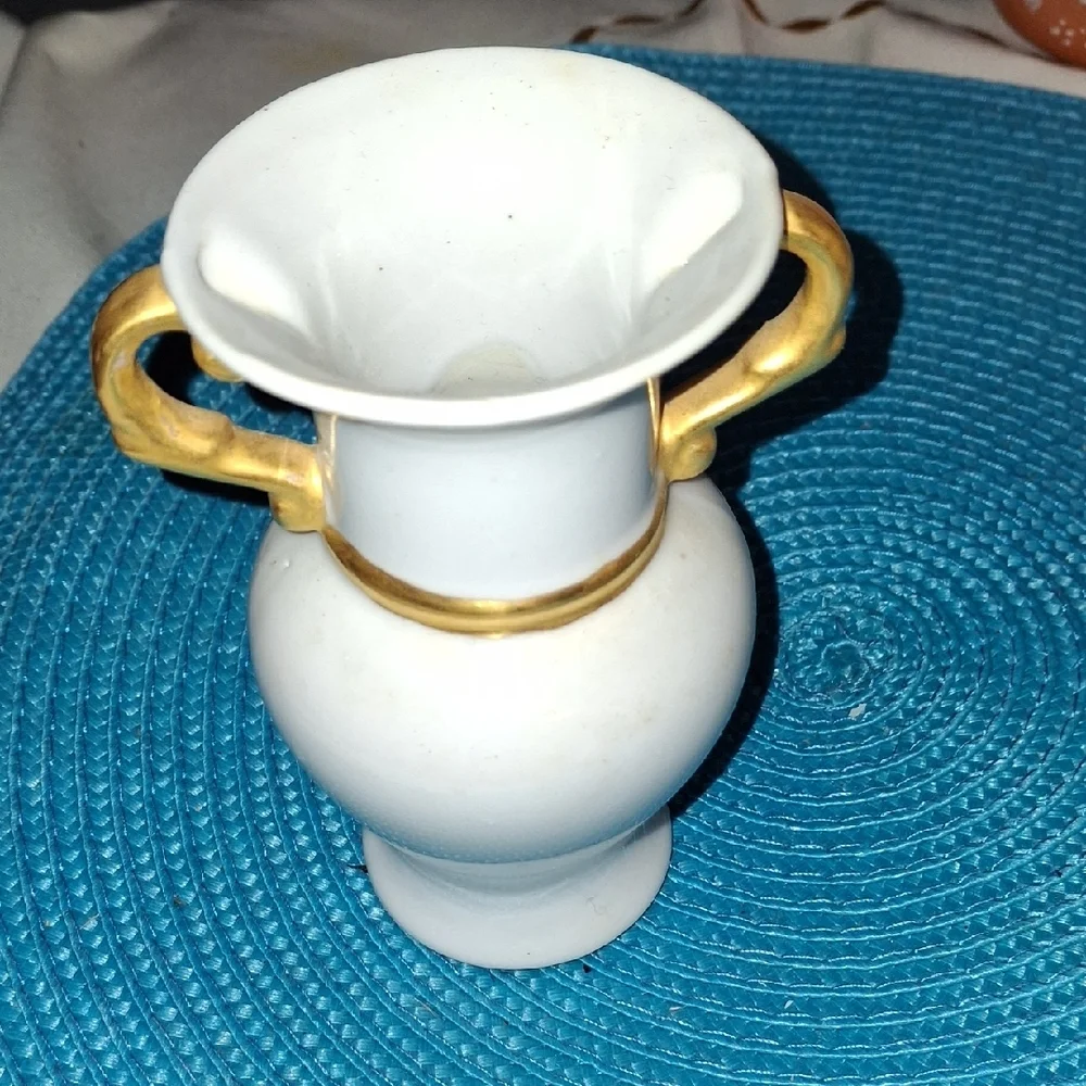 Elegant White Vase with Gold Accents